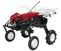 A Yanmar red black and white Walk-Behind Gas-Powered Vegetable Transplanter against a white background